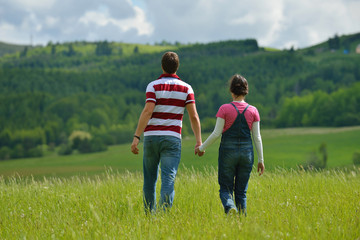 Portrait of romantic young couple smiling together outdoor