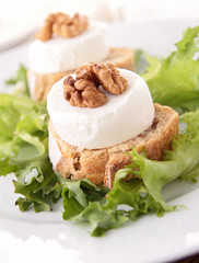 salad with grilled bread and goat cheese