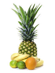 set of fruit: ananas, bananas, limes and orange isolated on whit