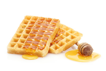belgium waffles with honey isolated on white