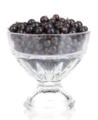 Black currant in glass isolated on white
