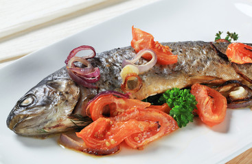 Baked trout with tomatoes and onion