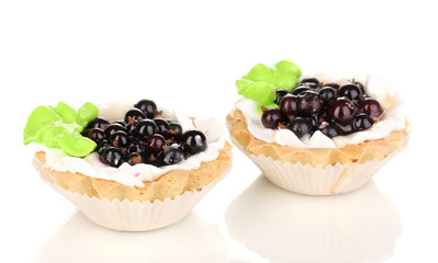 sweet cakes with berries isolated on white