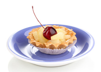 sweet cake with fruits on saucer isolated on white