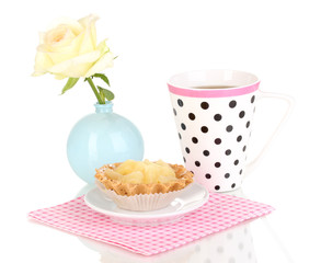 sweet cake with cup of tea isolated on white