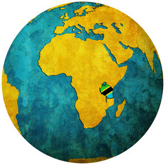 tanzania flag on globe map - obrazy, fototapety, plakaty