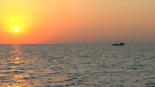 Sunset and fishing boat, Cuba