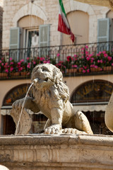 Lion fountain in the main town square of Assisi, Italy