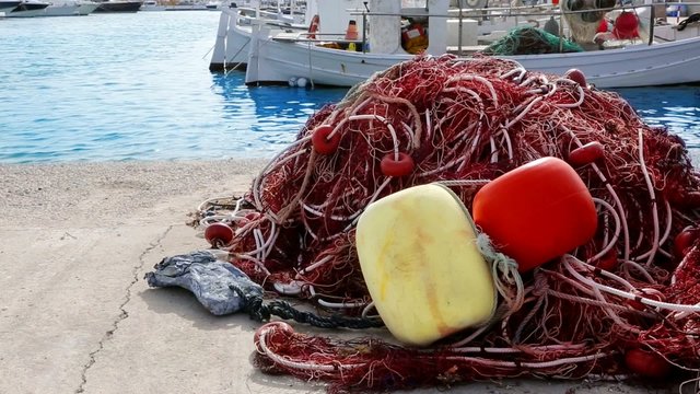 Balearic islands formentera port with trammel fisher nets buoys