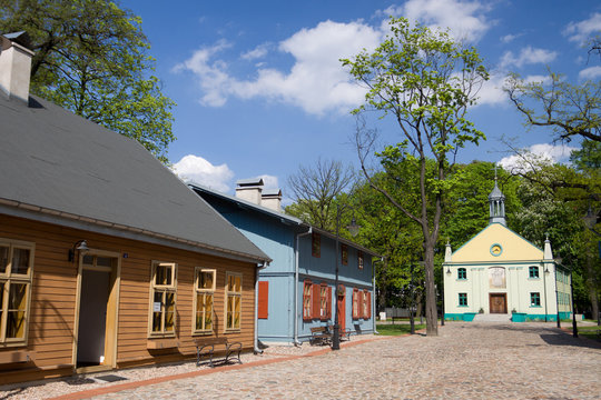 Fototapeta Green wooden houses in Lodz