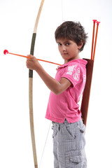 A little boy with a bow and arrow.