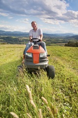 Man riding a lawn tractor