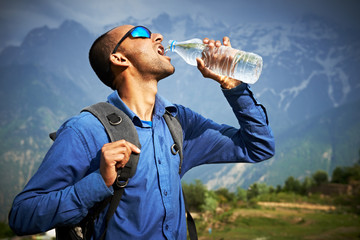 thirsty tourist drink a water