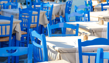 Traditional blue chairs in a greek restaurant