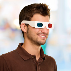 Man Watching Television In 3d Glasses