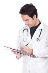 doctor standing and writing a prescription