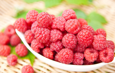 Raspberry in the white bowl