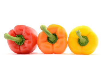 Three bell peppers isolated over white