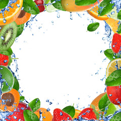 Fresh healthy fruit background with splashing water 