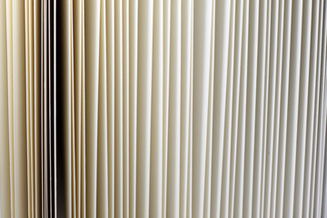 Closeup of vintage open book paper sheets texture background