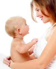 Young mother hugging baby