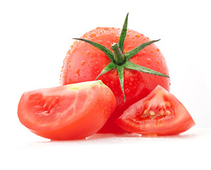 Tomato and slices isolated on white background, with water drops