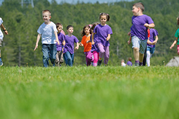Obraz premium happy kids group have fun in nature
