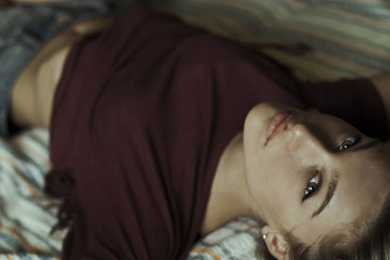 beautiful girl lying on the bed