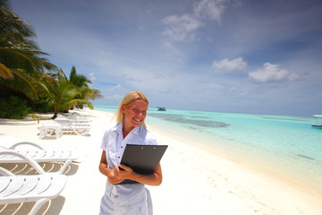 business woman on ocean coast