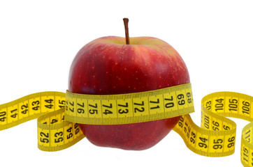 gala apple with measure tape on white background