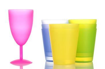 Bright plastic tableware isolated on white