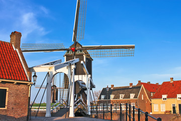 Bascule bridge and windmill at sunset. Heusden. Netherlands