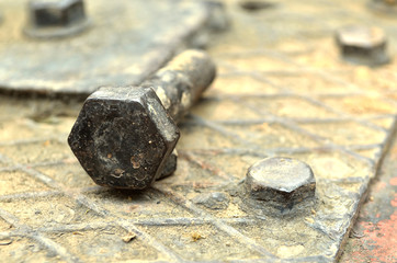 The rusted old iron nut which can't be turned off