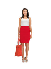 woman in dress with a bag