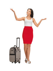 Obraz premium happy woman with suitcase greeting