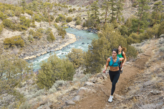 Hispanic runners training in remote area