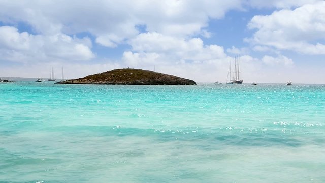 Formentera turquoise beach white sand and blue summer sky