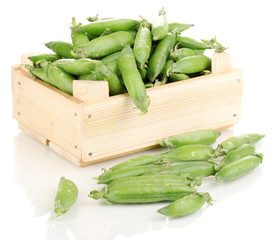 Green peas in crate isolated on white