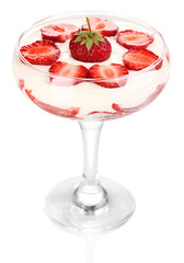 Glass of ripe strawberries with cream isolated on white