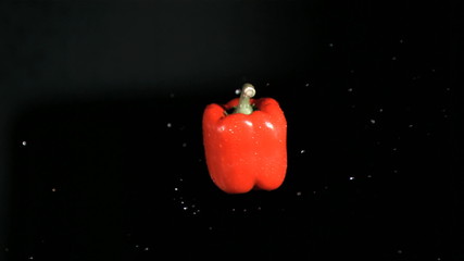 Red bell pepper rotating in super slow motion - Powered by Adobe