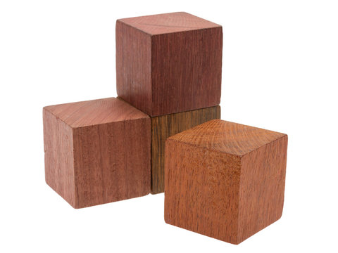 Several old cubes of wood, used by children for building