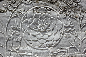 ancient marble flower carving
