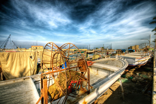 romantic scene of fishing boats at a port in Saida, South lebanon