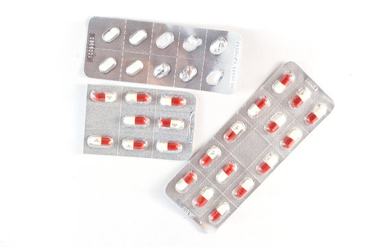 Medicine packs on white background