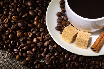 Coffee beans and white cup
