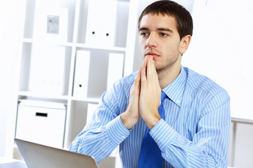 Young businessman in the office
