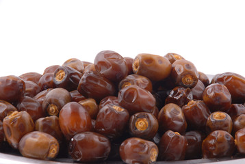 Fresh dates over white background
