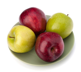 Apples pile on plate