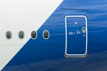 emergency exit and windows on a large passenger jet - 43354992