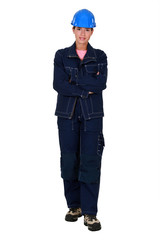 Female laborer standing on white background